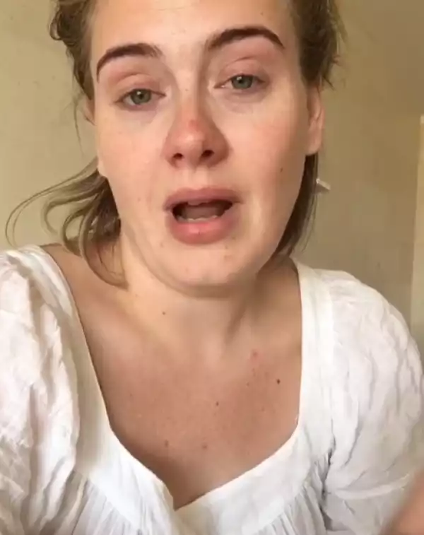 Adele shows makeup-free face in new video